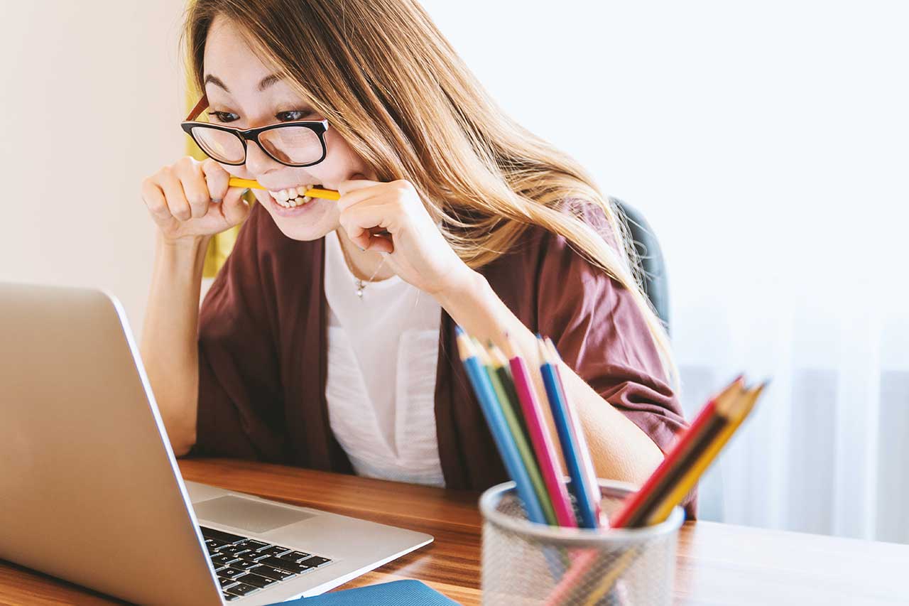 Girl stressing out at laptop