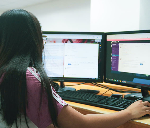 Data entry worker at their desk.