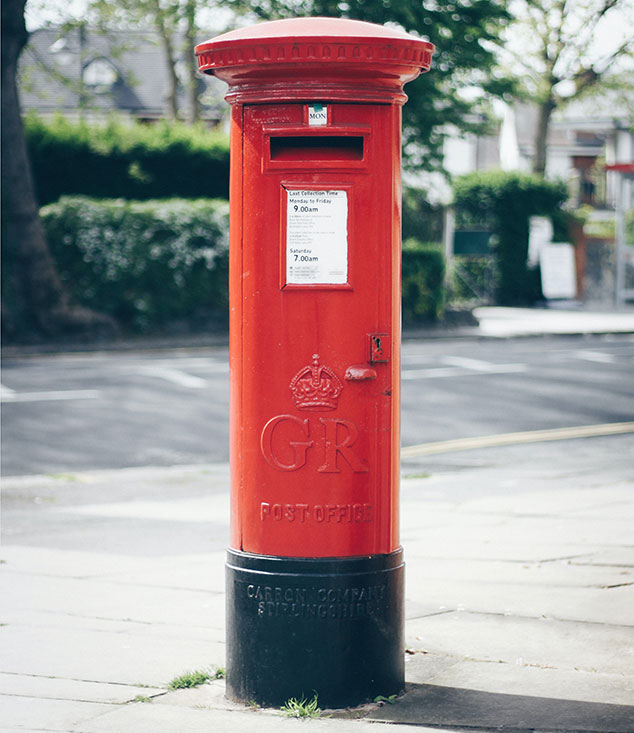 A post box with the initials GR