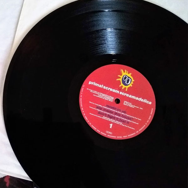 Scremadelica Vinyl Record Outside of its Sleeve